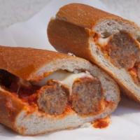 #53. Meatball Express · Homemade meatballs, marinara sauce, pesto, crushed red pepper topped with  melted provolone ...