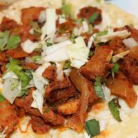 Al Pastor (Marinated Pork) · Delicious marinated pork taco!
Organic Corn Regular Size Tortilla.