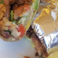Super Vegetarian Burrito  · Assorted Green Vegetables with beans, rice, pico de gallo, fresh avacado, sourcream and chee...
