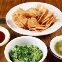 CHIPS, SALSAS & GUAC · Housemade corn tortilla chips, chipotle salsa, salsa verde & guacamole
