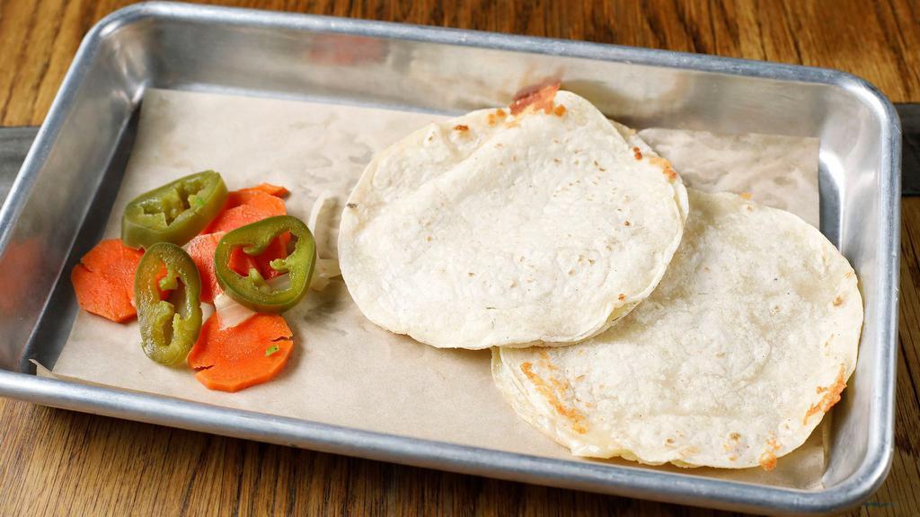MINI-QUESADILLAS · Two small corn tortillas, melted jack and cheddar cheese