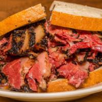 Hot Pastrami Sandwich · Delicious sandwich made with Pastrami and Swiss cheese. Topped with mustard.