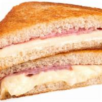 Grilled Ham & Cheese Sandwich · Delicious sandwich made with Ham, Swiss, American, & Jack cheese, and tomato slices.