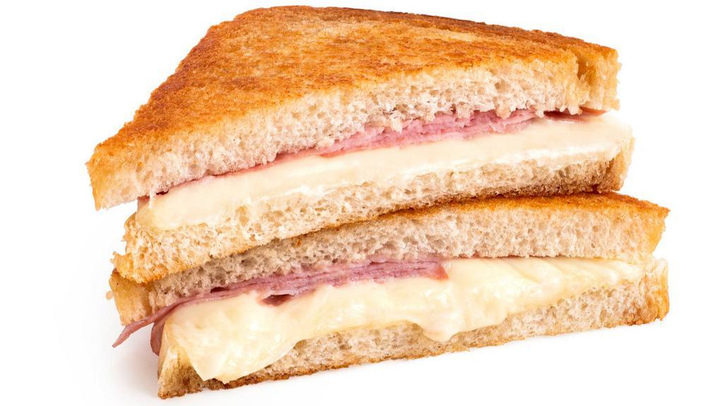 Grilled Ham & Cheese Sandwich · Delicious sandwich made with Ham, Swiss, American, & Jack cheese, and tomato slices.