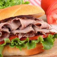 Roast Beef Sandwich · Delicious sandwich made with Roast Beef, Jack cheese, lettuce, tomato, and jalapeños. Topped...
