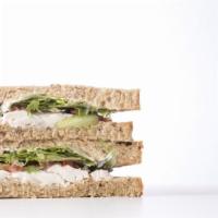 Chicken Salad Sandwich · Delicious sandwich made with Chicken Salad, Jack cheese, lettuce, tomatoes, and onions. Topp...