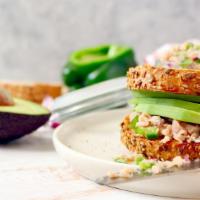 Cold Tuna Sandwich · Delicious sandwich made with Fresh Tuna, onions, and avocado. Topped with mayo.