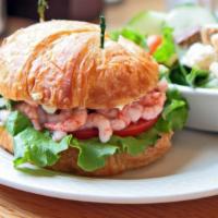 Shrimp & Crab Salad Sandwich · Delicious sandwich made with Shrimp, Crab meat, lettuce and tomatoes. Topped with mayo.
