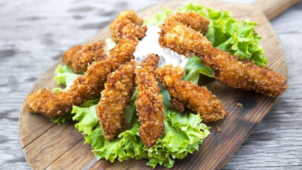 Crispy Chicken Tenders with Tartar sauce · Mouthwatering fried Crispy Chicken Tenders, seasoned with house spices and deep-fried to perfection. Served with a side of Tartar sauce.