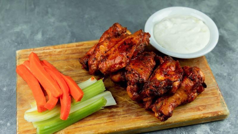Wings Your Way · Gluten-free. Six or nine wings oven baked, tossed in buffalo, sweet, and spicy or house dry rub with veggies and ranch or blue cheese.