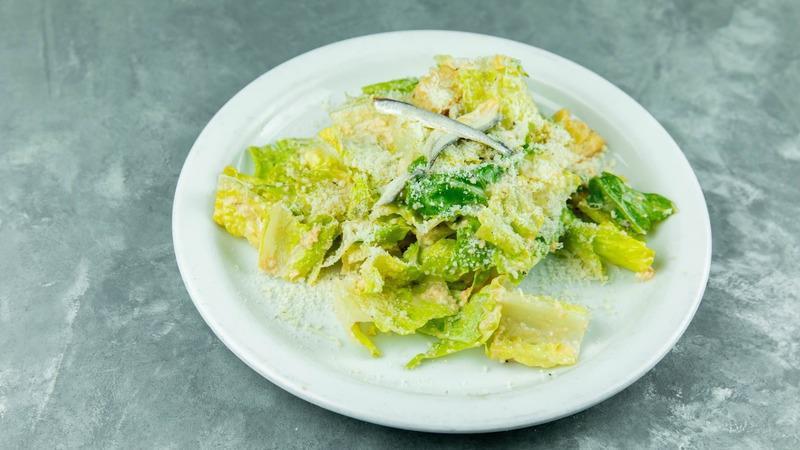 Caesar Salad · Romaine, parmesan, white anchovies, croutons and Caesar dressing.