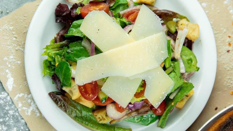 Mixed Greens Salad · Vegetarian. Baby greens, parmesan, croutons, cucumber, carrots, grape tomatoes, red onion and your choice of salad dressing.