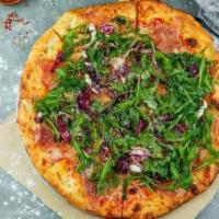 Prosciutto & Arugula Thin Crust Pizza · Mozzarella, aged prosciutto, parmesan, fresh arugula, and radicchio mix, home-made tomato sa...