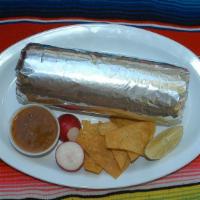 Chorizo and Eggs Burrito · Sausage and eggs, refried beans, rice, and cheese.