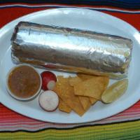 Ham and Eggs Burrito · Ham and eggs, refried beans, rice, and cheese.
