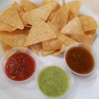 Chips & Salsa · A bag of corn tortilla chips and salsa bar choices.