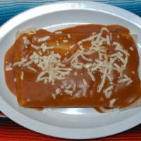 Wet Quesadilla · Flour tortilla stuffed with your choice of meat and cheese. Topped with red sauce and cheese