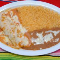 Taco or Enchilada Plate · Includes one taco or enchilada with rice, re-fried beans and cheese.