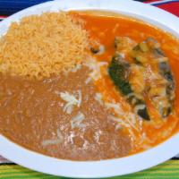 Chile Relleno Plate · Chile relleno with rice, refried beans and cheese.