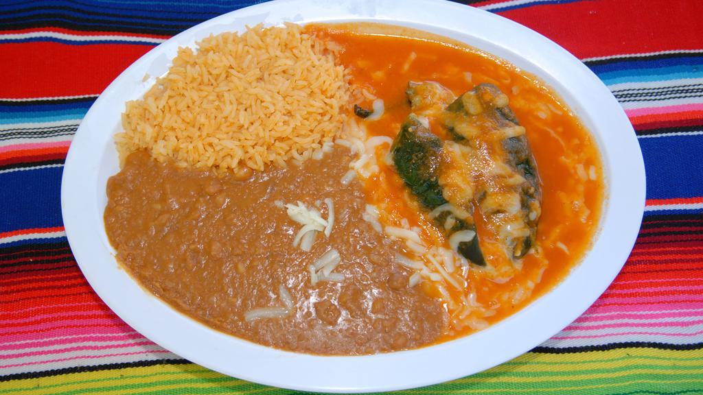 Chile Relleno Plate · Chile relleno with rice, refried beans and cheese.