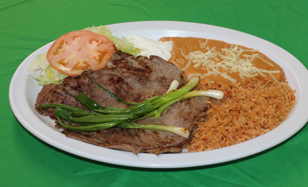 Mexican Dinner Plate · Served with choice of meat, rice, re-fried beans, lettuce, sour cream, guacamole and tortillas.