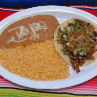 Kids Quesadilla Plate · Cheese quesadilla with rice and re-fried beans and cheese.