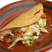 Quesadilla Chilanga · Handmade corn tortilla filled with cheese, lettuce, salsa, and cream.