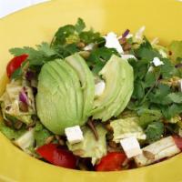 Ensalada Doña Luz (Large) · Veronica's mom's favorite salad: greens, cabbage, tomato, avocado, cheese, and pumpkin seed ...