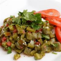 Ensalada De Nopales (Cactus Salad) · Cactus, onion, cheese, cilantro, and tomato.
