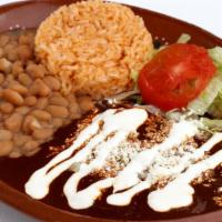Enchiladas · Two enchiladas with cheese and salsa verde or mole sauce. Topped with cilantro, onions, chee...