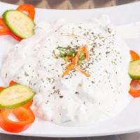 Tzatziki Salad · Cucumber yogurt mix with mint garlic and lemon.