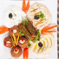 Veggie Combo Plate · Hummus, Baba Ganoush, Dolma, Falafel, Tabbouleh.