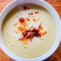 Red Lentil Soup · Blended carrot, onion and potato with caramelized onion, sesame seed and paprika. Served wit...
