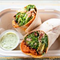 Red Lentil Balls Wrap · Red lentil, bulgur, tabouli, fried onion wrapped in warm and freshly made lavash. Comes with...