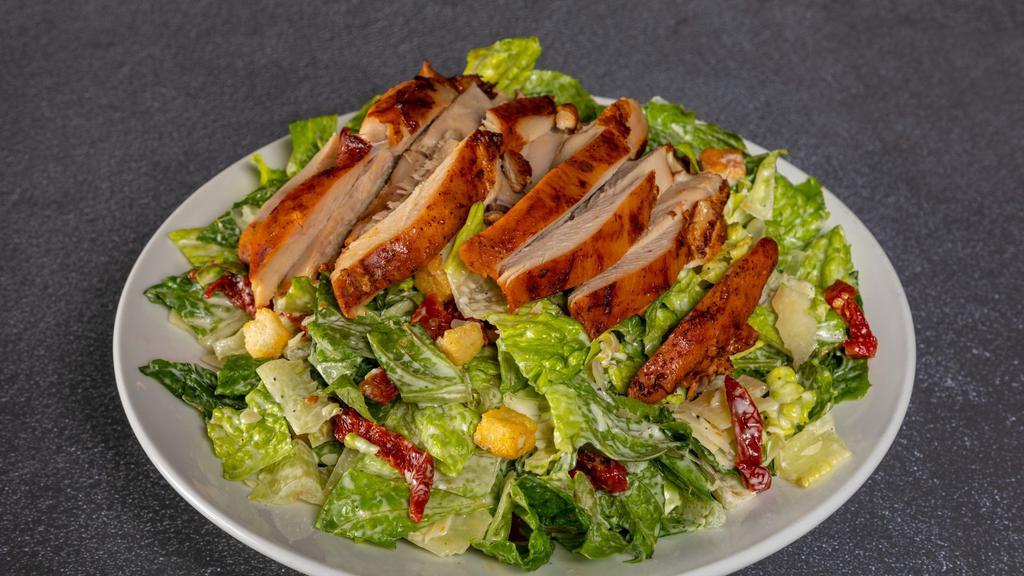 Caesar Salad · Chopped romaine, shaved parmesan, homemade crouton, sun-dried tomatoes and Caesar dressing.


Add your choice of protein for an additional charge.