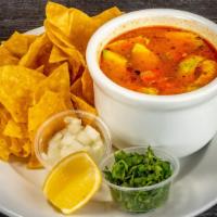 Chicken Tortilla Soup Cup · grilled chicken, tortilla strips, avocado, Jack cheese, 
onions, cilantro, served with torti...