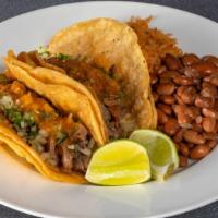 Taco Combo · Two tacos with grilled chicken, carnitas, chile verde or Mexi Veggie with onions and cilantr...