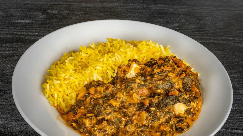 Palak Paneer · Spinach curry with paneer cheese served with saffron basmati rice.