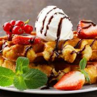 Strawberry Ice Cream Waffle · Traditional waffle decked with strawberry ice cream.