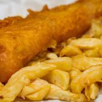 Fish & Chips · Hand-battered and crisp, served with French fries and house tartar sauce.