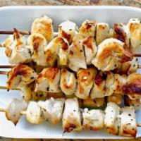 Chicken Souvlaki · Skewered chicken breast, onions, peppers, and tzatziki with rice and pita.
