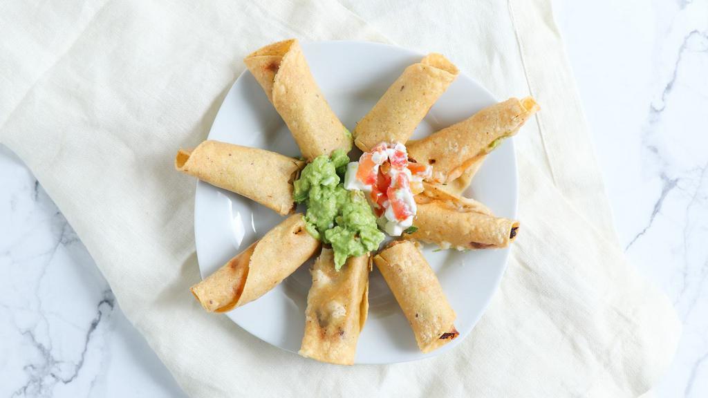 FLAUTAS · Crispy corn tortillas filled with your choice of chicken, shredded beefor combo. Topped with sour cream, salsa fresca and guacamole.
