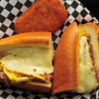Pam's Philly · Two large eggs, molinari Italian sausage, onions, and mozzarella cheese. Hash brown on the s...
