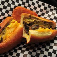 Megan's Philly · Two large eggs, bell peppers, mushrooms, onions, jack and cheddar cheese. Hash brown on the ...