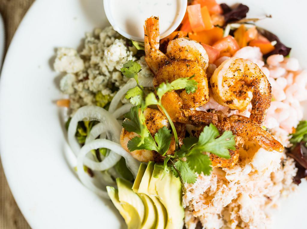 Seafood Cobb Salad · Prawns, crab, bay shrimp, avocado, hard boil egg, tomato and blue cheese.