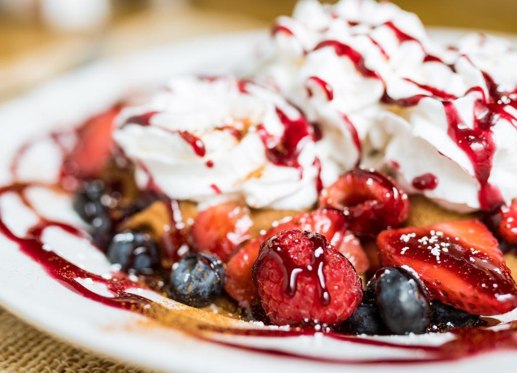 Swedish Pancakes (Icelandic, Of Course) · Thin (crepes). Served cold with mixed berries, raspberry sauce and whipped cream.