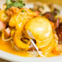 Santa Fe Benedict · Grilled onion, tomato, avocado with spicy hollandaise sauce.
