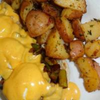 Irish Benedict · Our house made corned beef hash. English muffin and Hollandaise sauce.