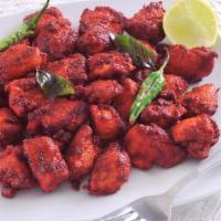 Chicken 65 · Deep fried boneless chicken pieces marinated with spices. Believed to be originated from Che...