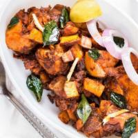 Chicken Sukka · Chicken dry dish with very little gravy. Prepared with small onions, freshly ground cumin an...